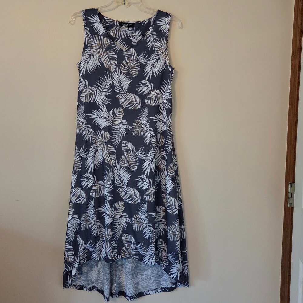 Sleeveless Summer dress with cute hi-low hemline.